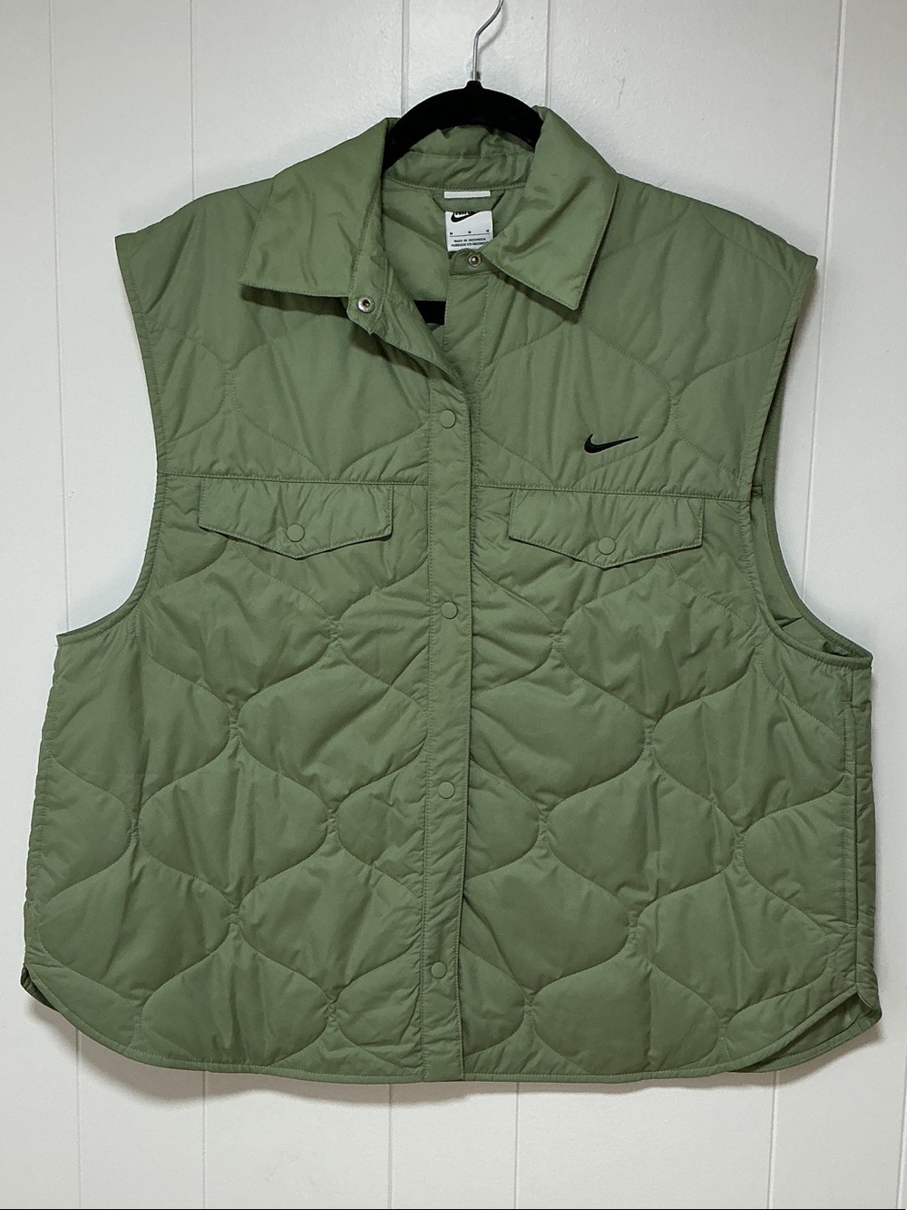 Nike light weight puffer vest.